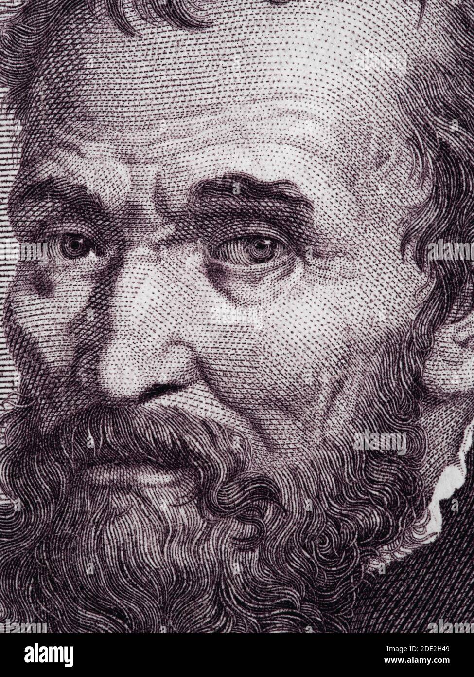 Michelangelo Buonarroti portrait on Italy 1000 lira banknote (1970) close up macro. Genius Italian sculptor, painter, architect, and poet of the High Stock Photo