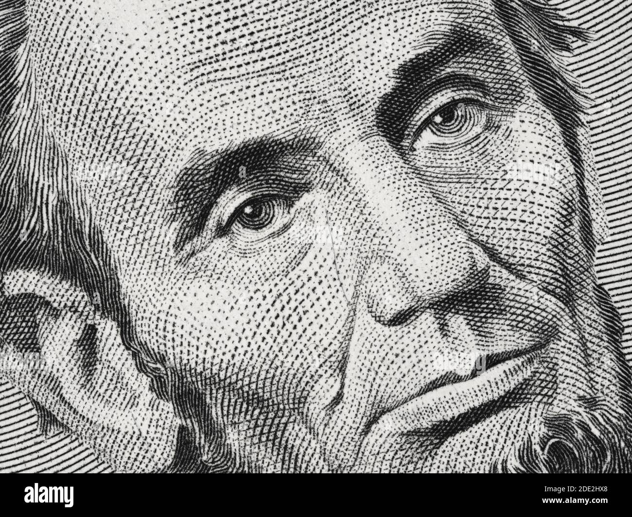 US President Abraham Abe Lincoln on USA five dollar bill extreme macro, 5 usd, United States of America money closeup Stock Photo
