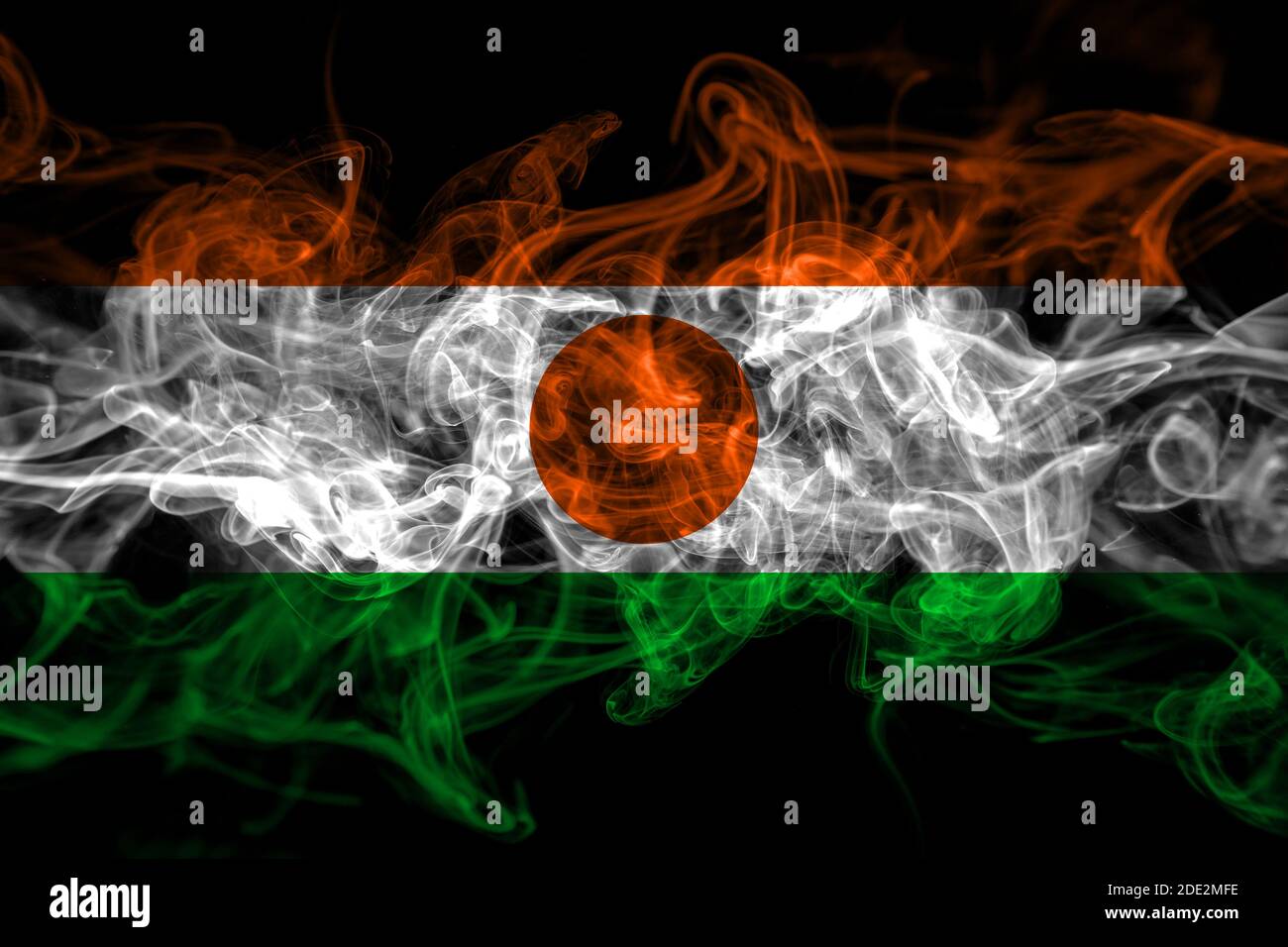 Niger, Nigerien smoke flag isolated on black background Stock Photo
