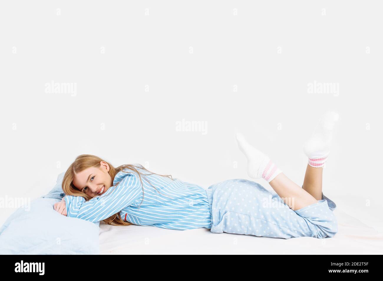 Girl in pajamas lying on hi-res stock photography and images - Alamy
