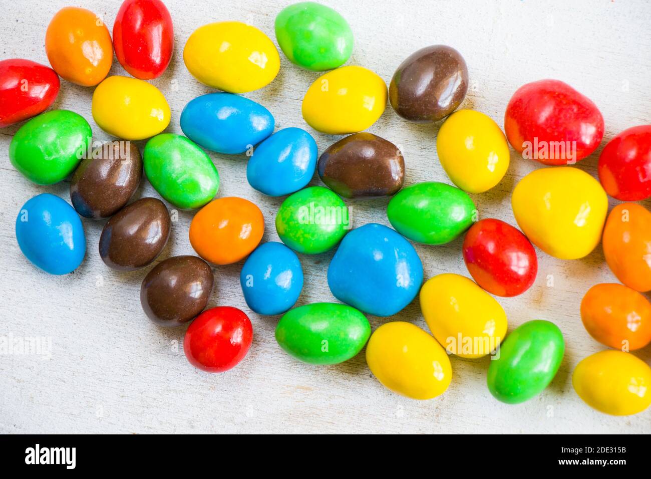 M&M's candy on the white background, colorful candy texture ...