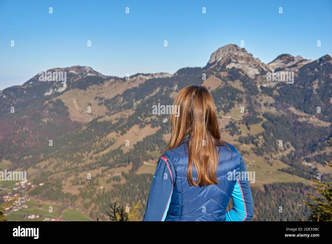 Brown haired Woman on a mountain Stock Photo