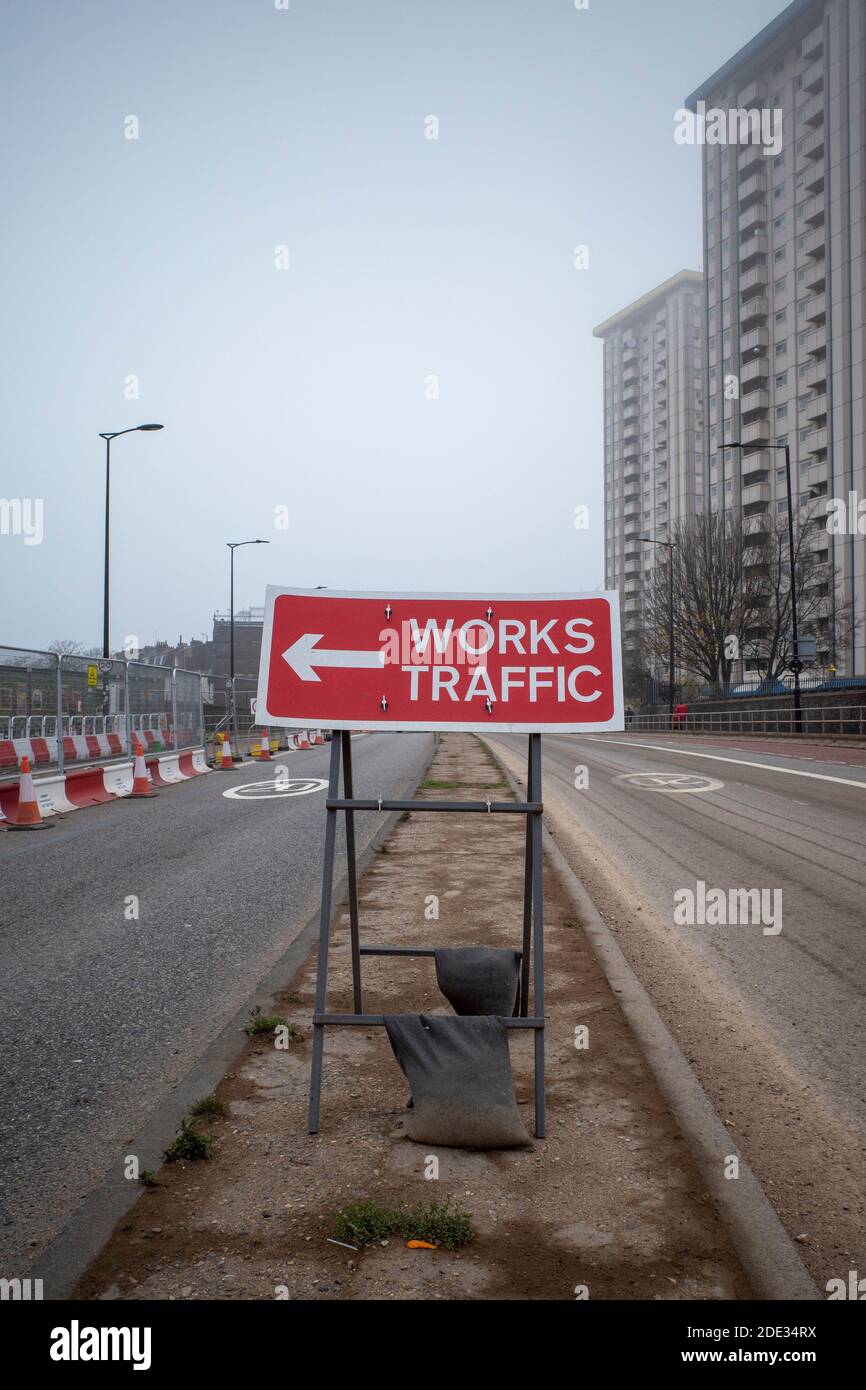 Works Traffic road signs outside the HS2 construction work on Hampstead Road in Camden Town, London, England Stock Photo