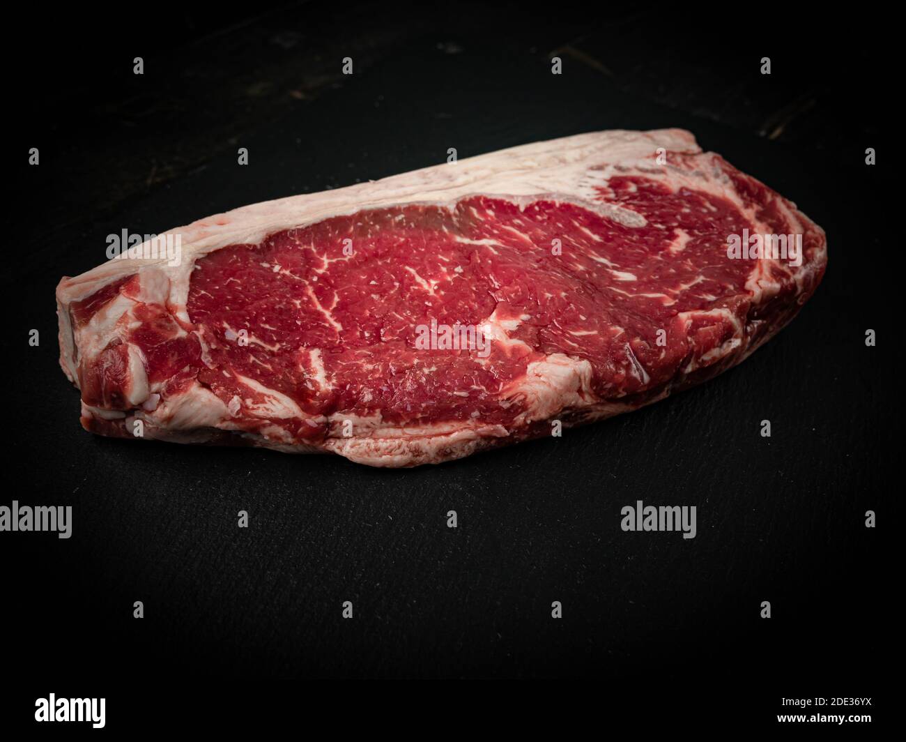 Raw ribeye beef steak. Texture of marble meat. Top view Stock Photo Alamy