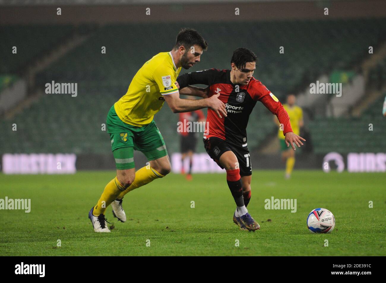 Norwich, UK. Coventrys Callum O' Hare and Norwichs Grant Hanley during the Sky Bet Championship match between Norwich City and Coventry City at Carrow Road, Norwich on Saturday 28th November 2020. (Credit: Ben Pooley | MI News) Credit: MI News & Sport /Alamy Live News Stock Photo