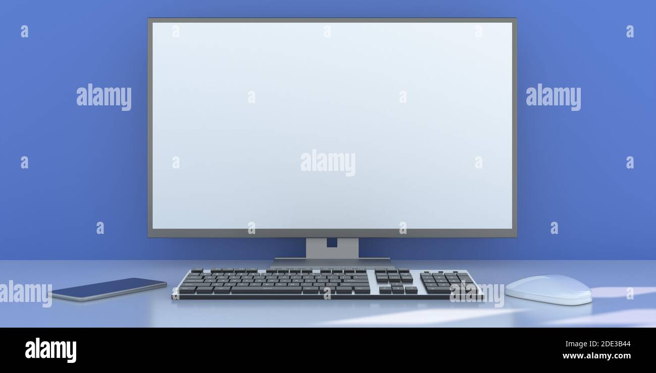 Blank white screen on a computer desktop monitor, blue color wall