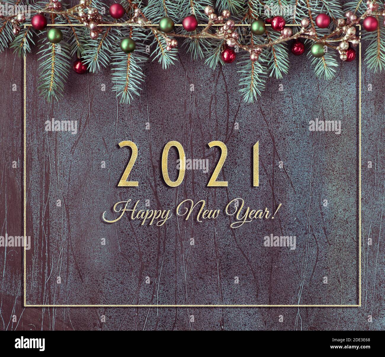 Happy New Year 2021 text. Christmas background with fir twigs, red and