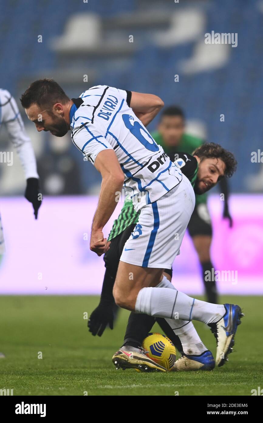 Matteo Darmian of FC Internazionale fights for the ball against Henrikh  Mkhitaryan of AS Roma during the Serie A 2020/21 / LM Stock Photo - Alamy