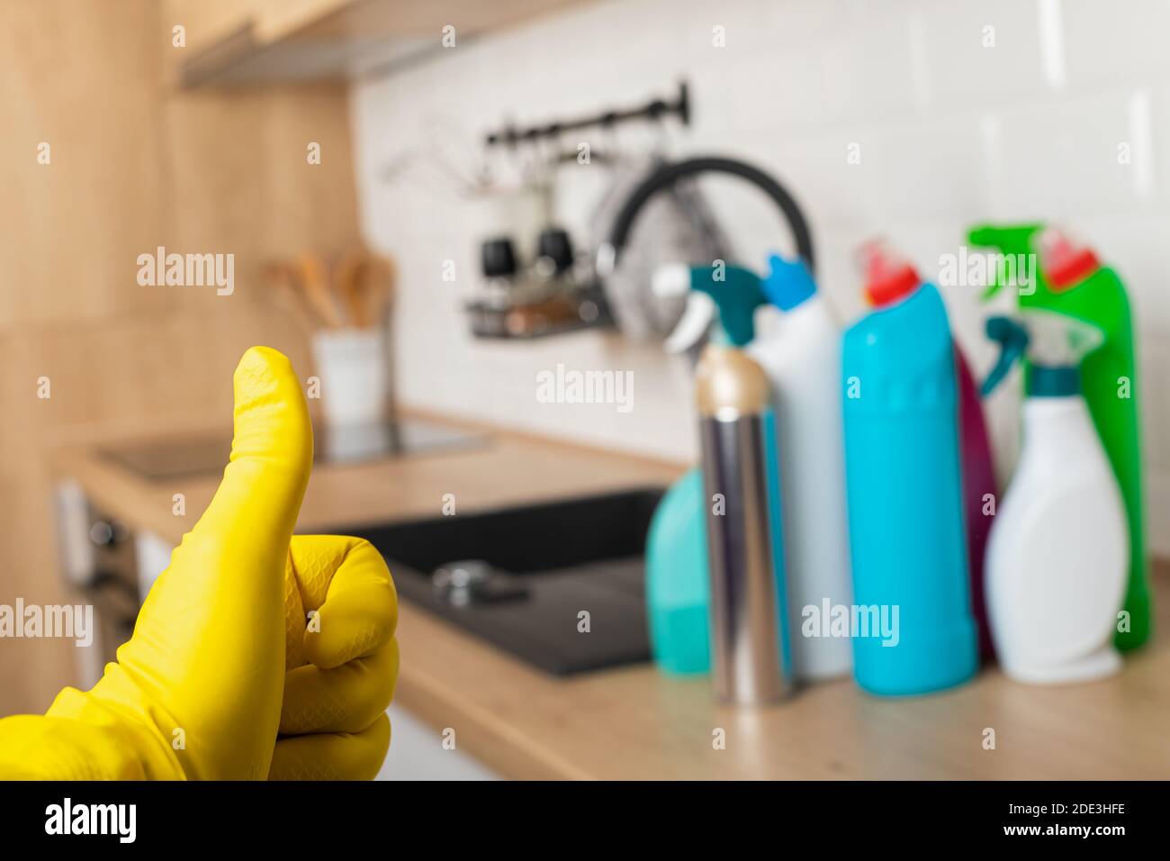 Colorful cleaning products in the kitchen Stock Photo Alamy