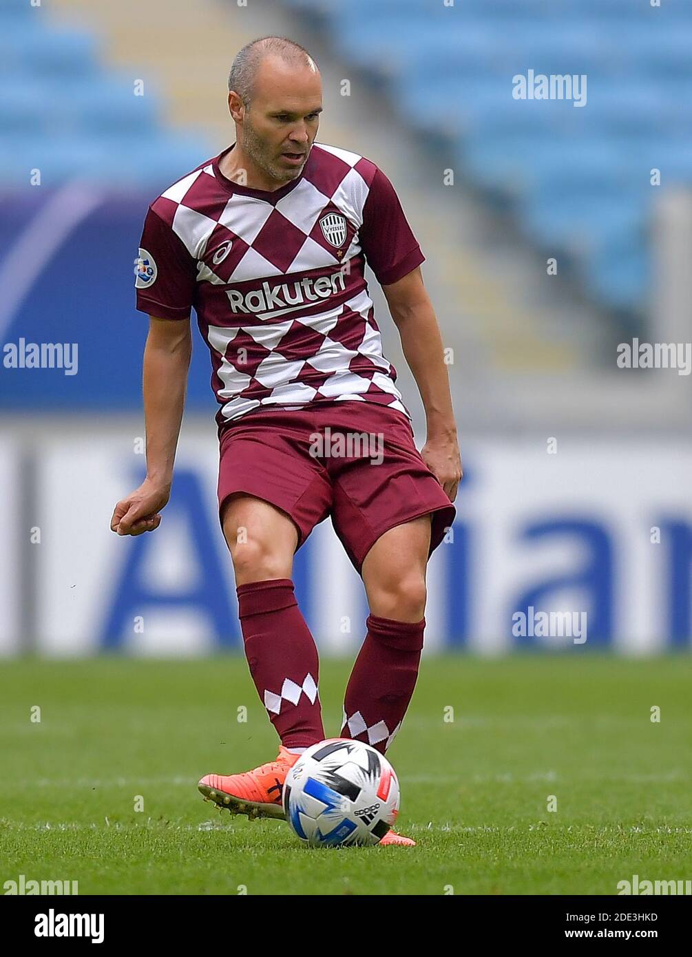 Doha, Qatar. 28th Nov, 2020. Andres Iniesta of Vissel Kobe passes the ball during a Group G football match of the AFC Champions League between Guangzhou Evergrande FC and Vissel Kobe in Doha, Qatar, Nov. 28, 2020. Credit: Nikku/Xinhua/Alamy Live News Stock Photo