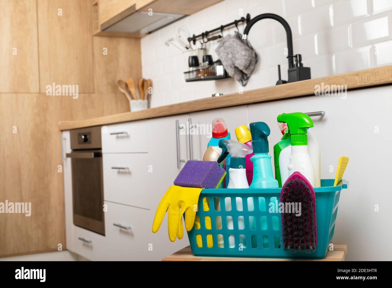 Colorful cleaning products in the kitchen Stock Photo Alamy
