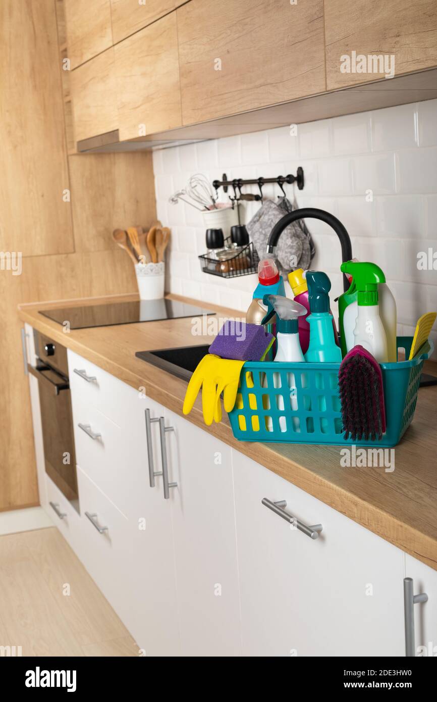 Colorful cleaning products in the kitchen Stock Photo Alamy