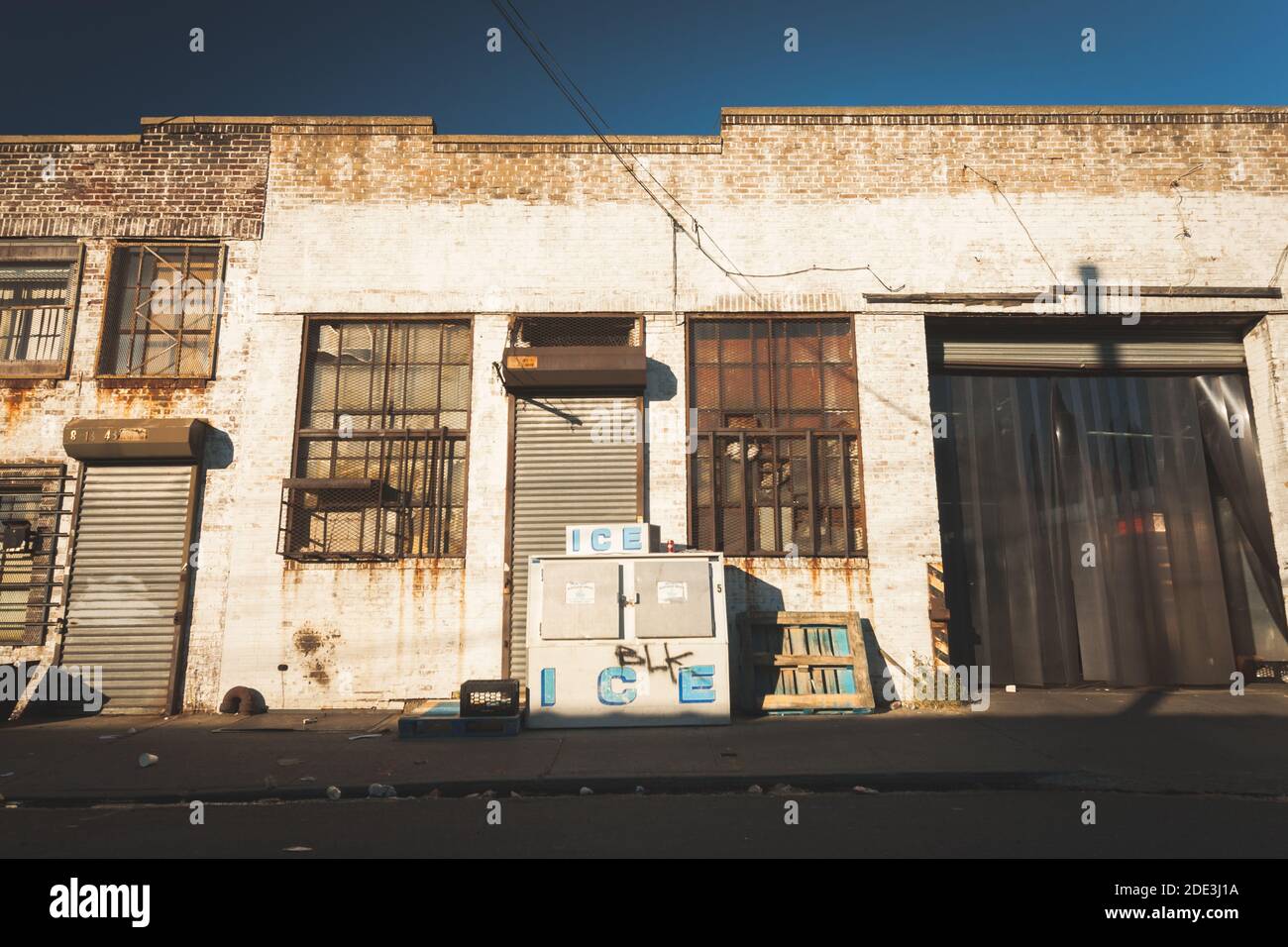 A industrial building warehouse and street scene with vintage ice