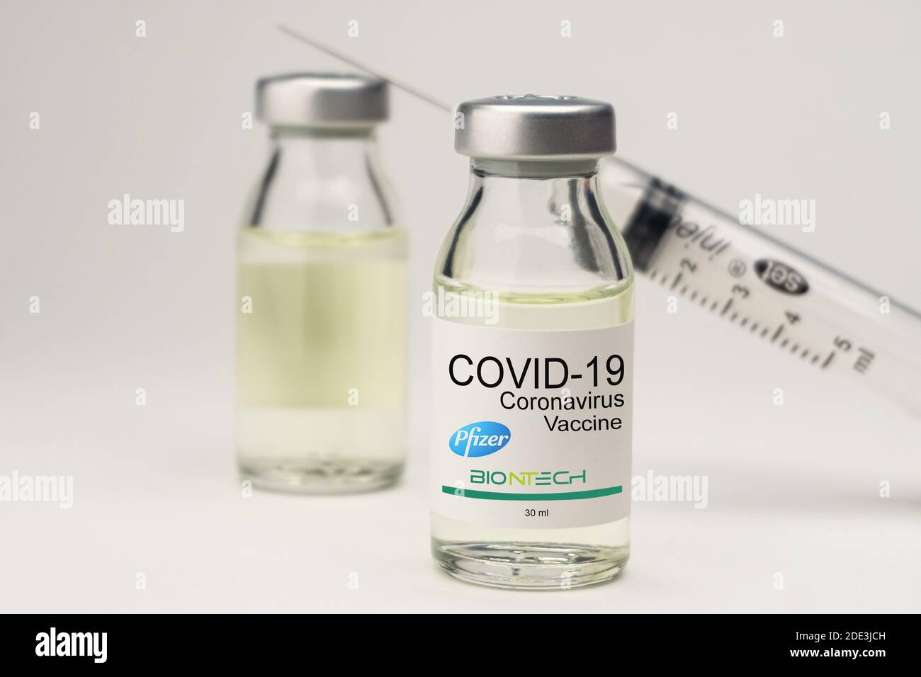 Izmir, Turkey - November 18 2020: Coronavirus vaccine concept and background. New vaccine pfizer and biontech isolated on white background. Covid-19 Stock Photo
