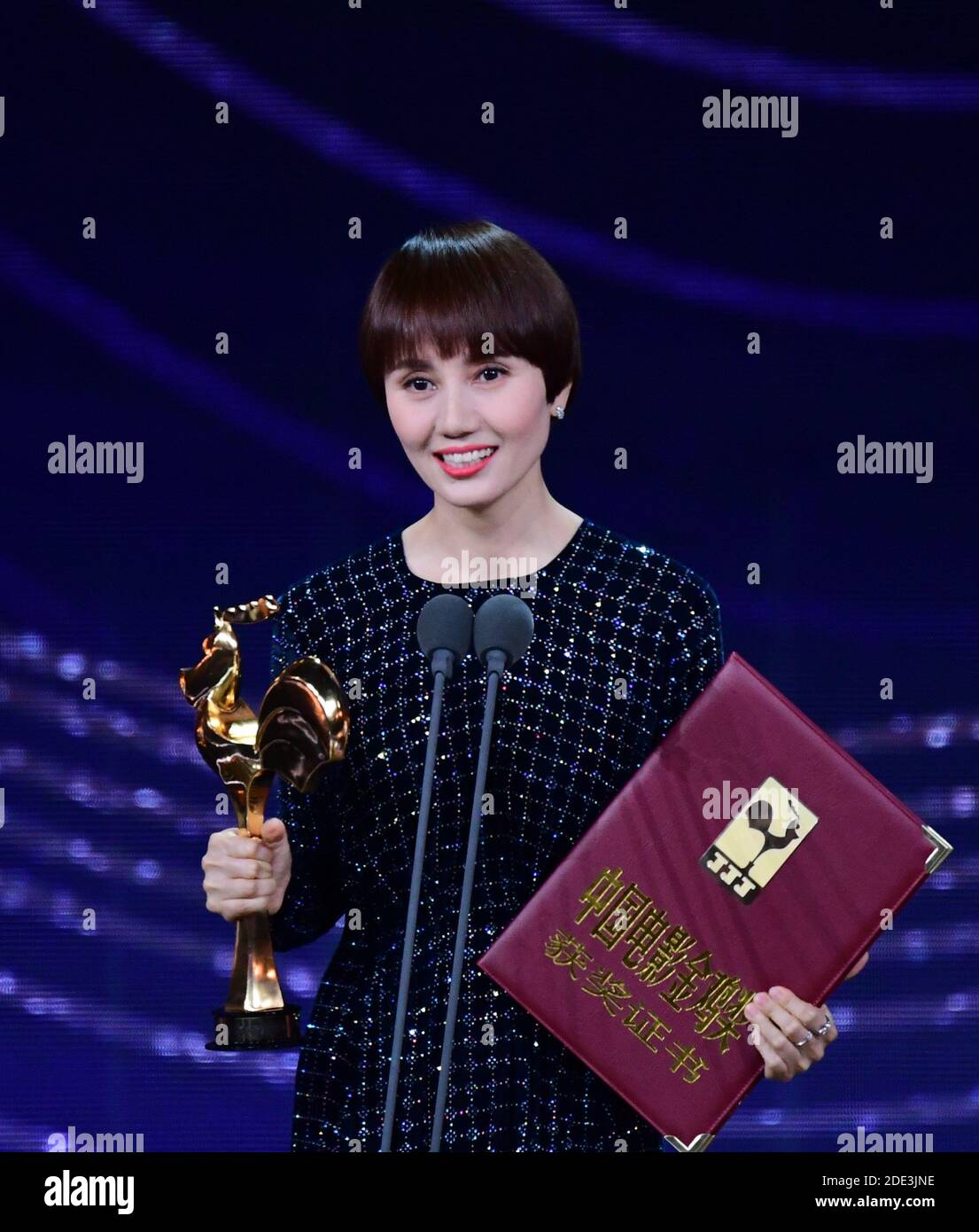 Xiamen, China's Fujian Province. 28th Nov, 2020. Yuan Quan is honored with the Best Supporting Actress Award at the awarding ceremony of the 33rd China Film Golden Rooster Awards held in Xiamen, southeast China's Fujian Province, Nov. 28, 2020. Credit: Wei Peiquan/Xinhua/Alamy Live News Stock Photo