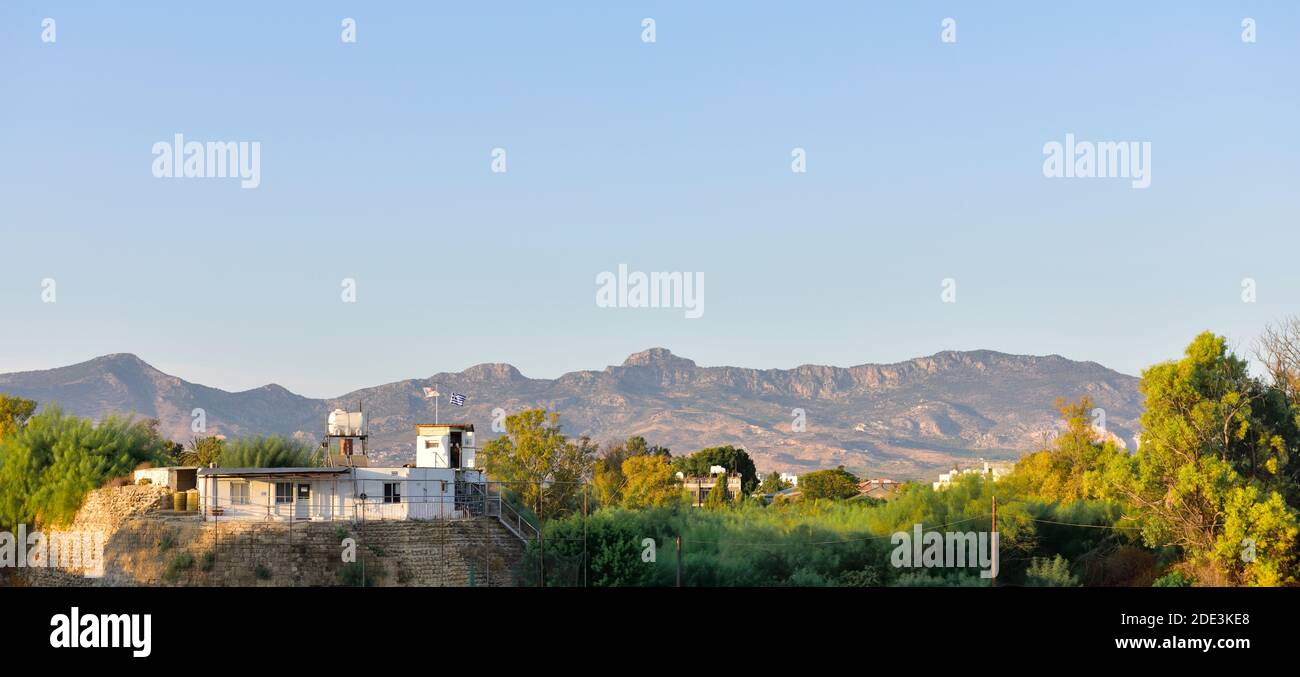 Looking across the UN Buffer zone from Greek South Nicosia to Turkish North Nicosia and mountains beyond, Cyprus Stock Photo