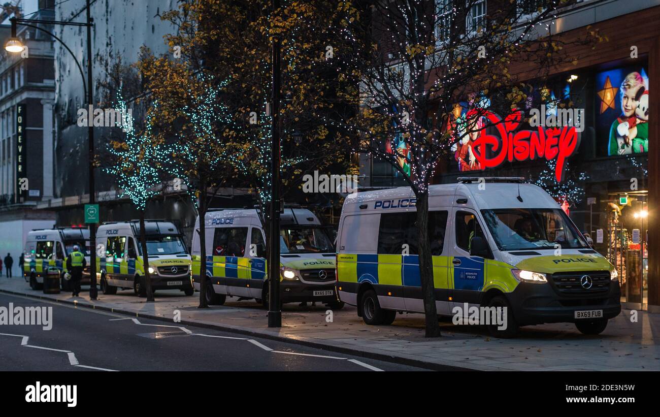 Police vans outside Disney store on Oxford Street during the pandemic  lockdown in London Stock Photo - Alamy