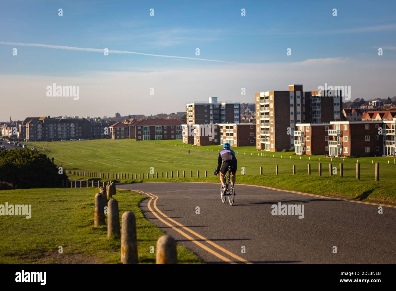 Cyclist on top of Galley Hill, Bexhill Stock Photo