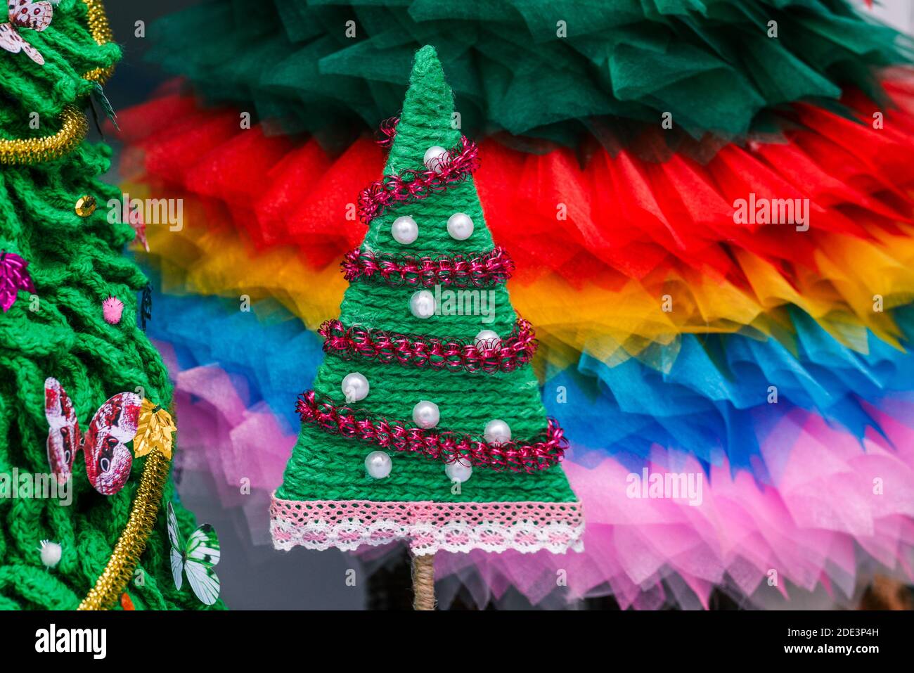 Decorative Christmas tree made of fabric. New year concept. Festive mood. Stock Photo