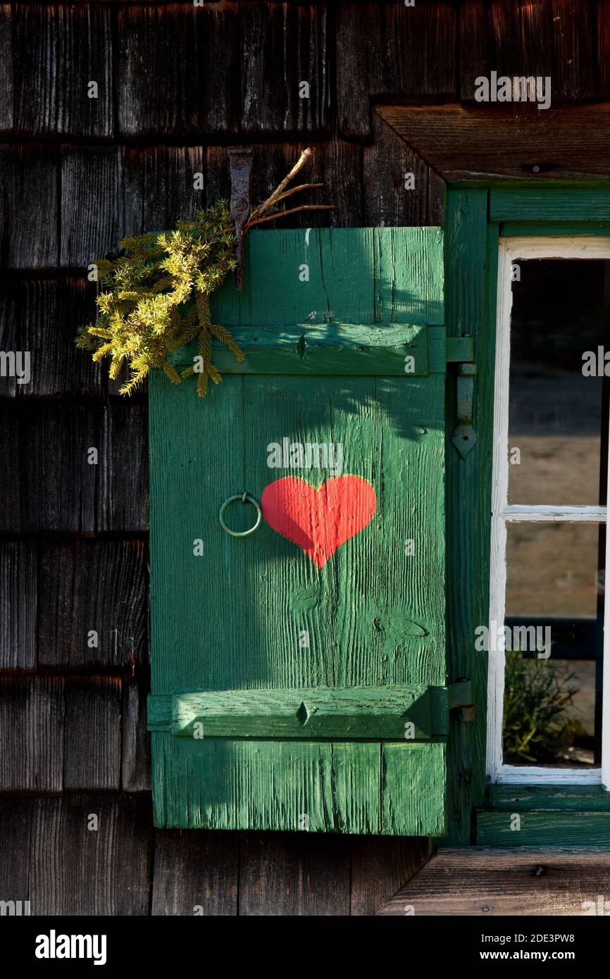 red heart painted on wooden shutter Stock Photo