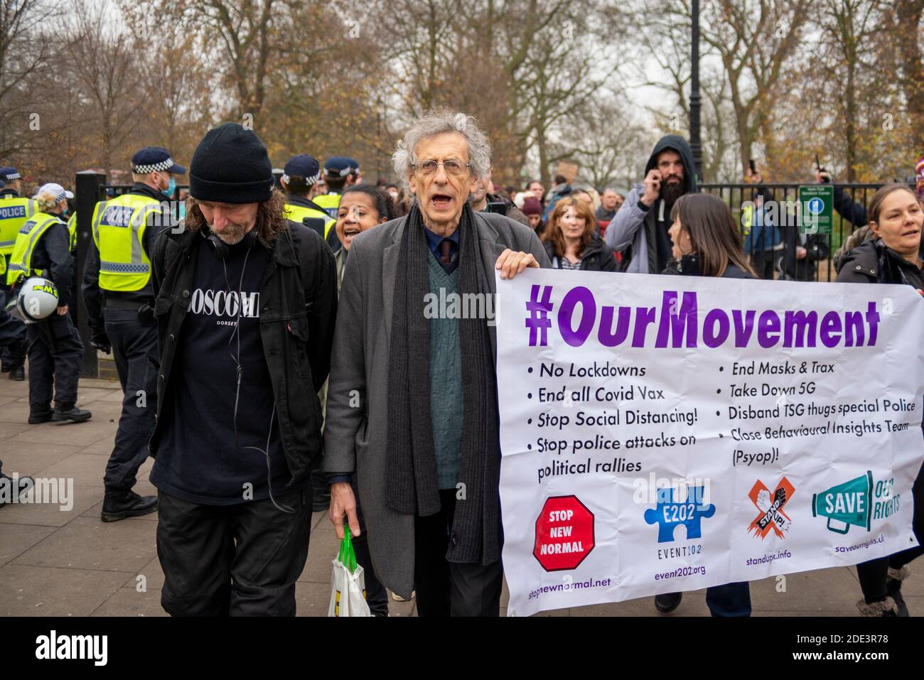 Piers Corbyn leading an anti lockdown protest march in Hyde Park, London, UK, carrying an Our Movement banner. Anti mask, anti vaccine, anti 5G, E202 Stock Photo