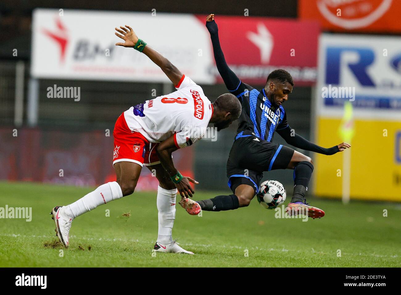 Mouscron's Jean Onana and Club's Clinton Mata fight for the ball during the  Jupiler Pro League match between Royal Excel Mouscron and Club Brugge KV  Stock Photo - Alamy