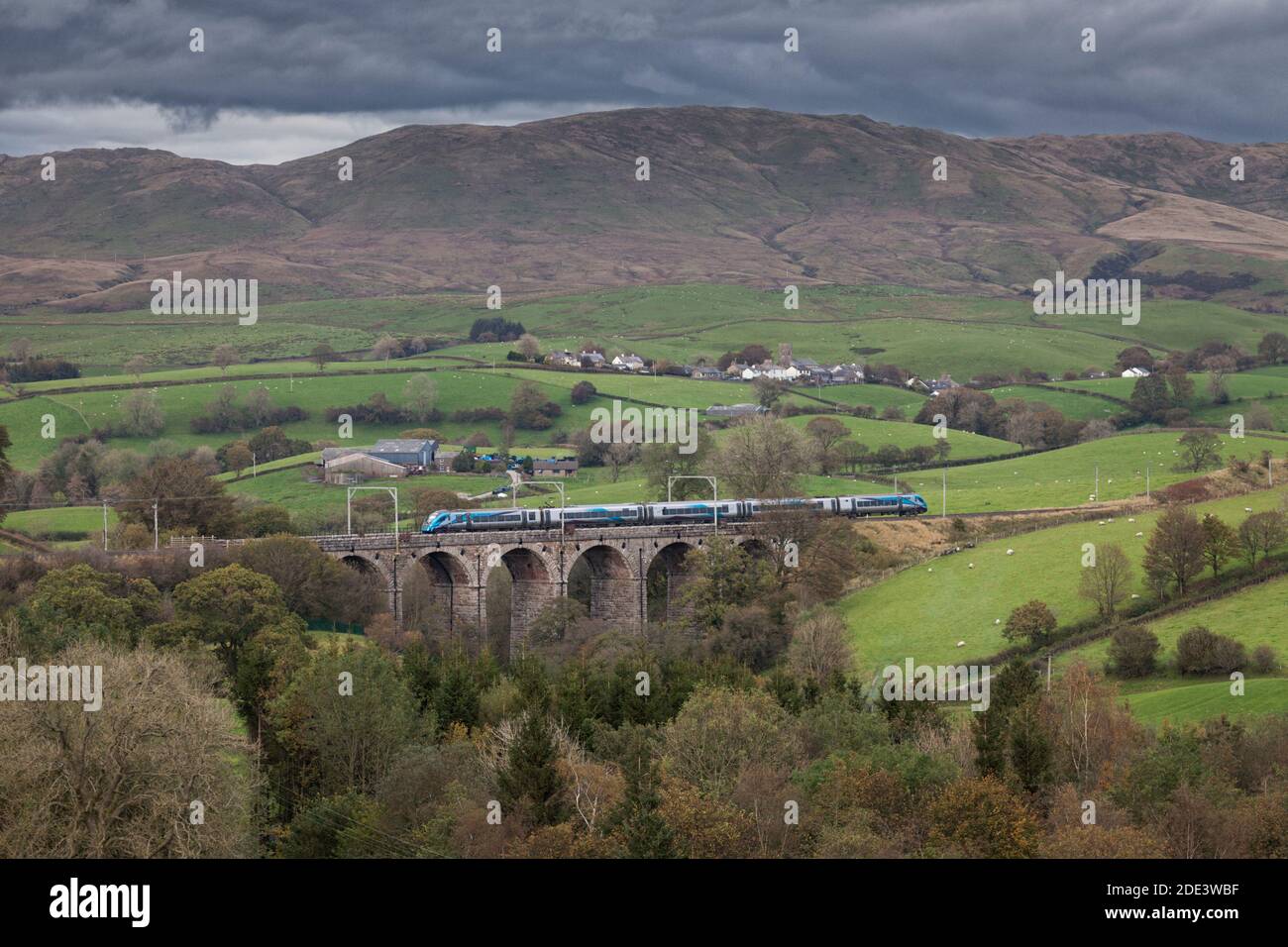 First Transpennine Express CAF class 397 Nova 2 electric train crossing Docker viaduct on the west coast mainline in Cumbria Stock Photo