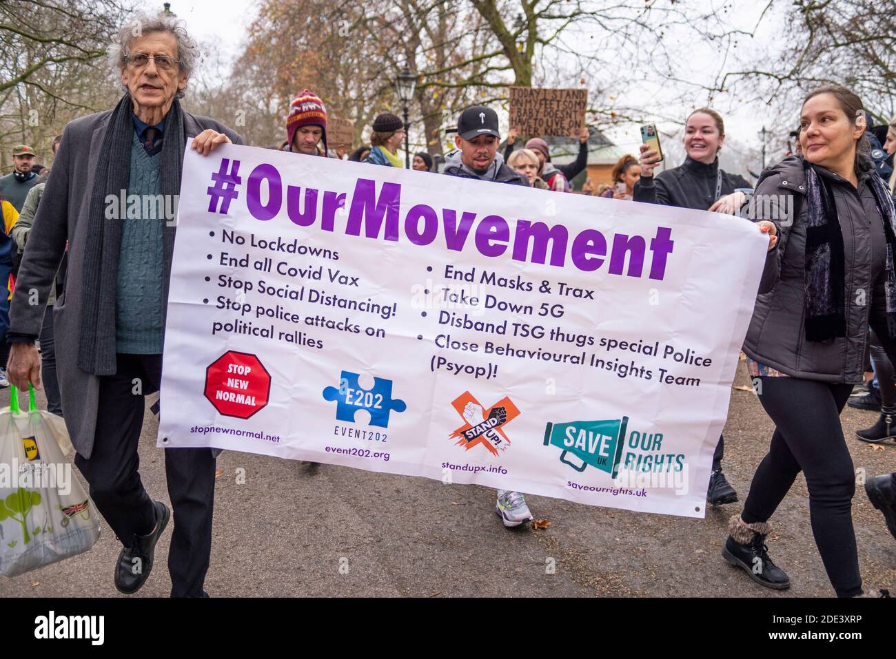 Piers Corbyn leading an anti lockdown protest march in Hyde Park, London, UK, carrying an Our Movement banner. Stop new normal, anti mask, anti vax Stock Photo