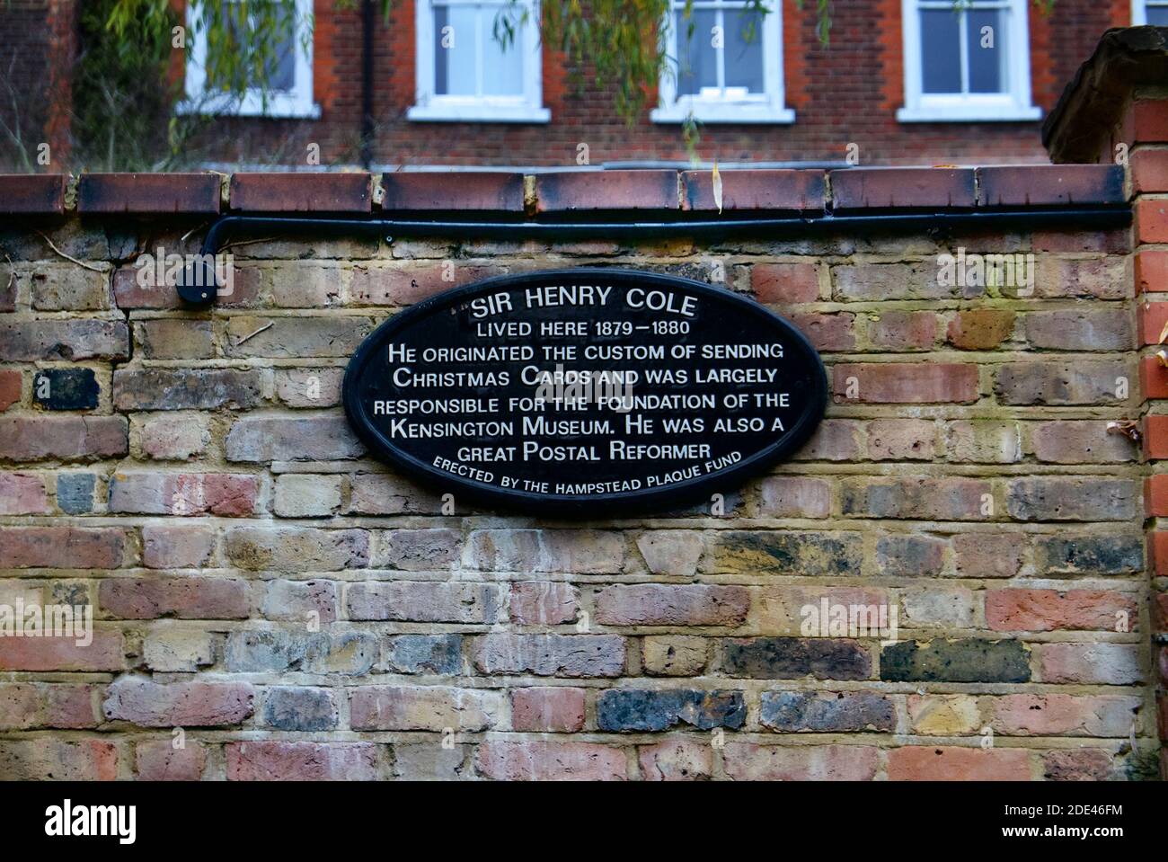 Sir Henry Cole, inventor of Christmas cards and post reformer, plaque by Hampstead Plaque Fund dedicating where he used to live in Hampstead Village. Stock Photo