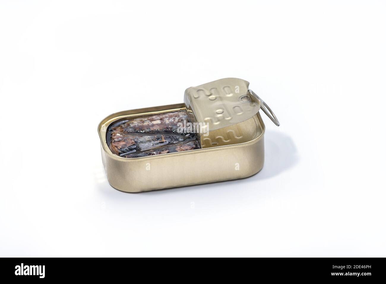 Closeup of an open can of sardines isolated on white background. Canned