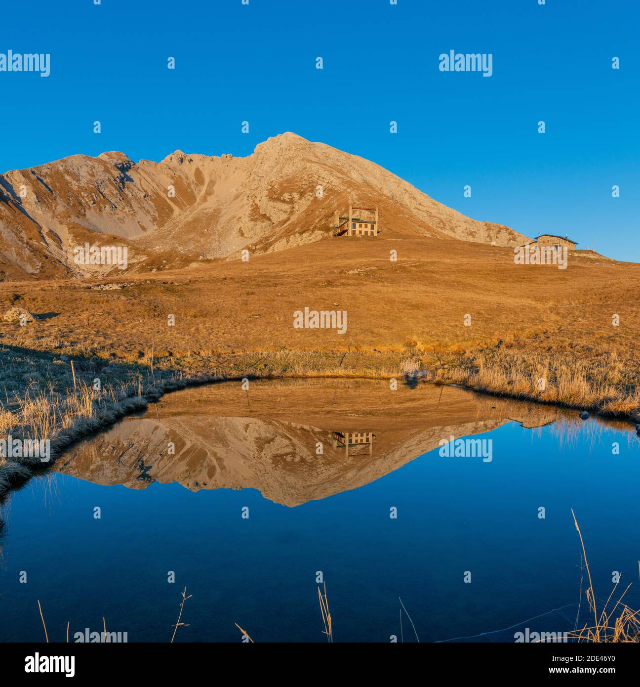 Mountain pond reflecting peaks hi-res stock photography and images - Alamy