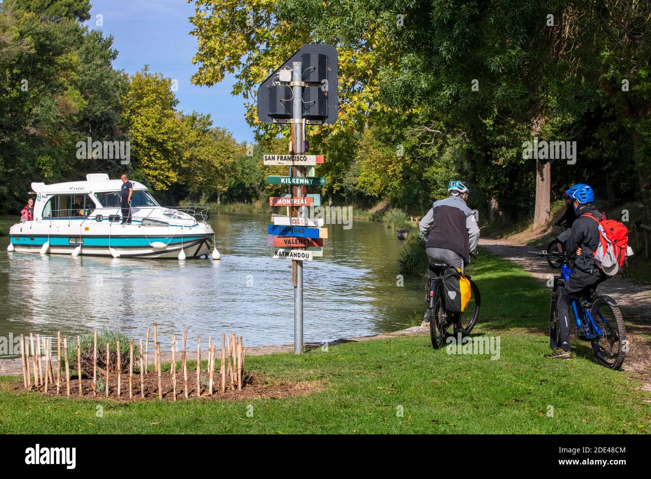 The Canal du Midi, near Carcassonne, French department of Aude, Occitanie Region, Languedoc-Rousillon France. Boats moored on the tree lined canal.  T Stock Photo