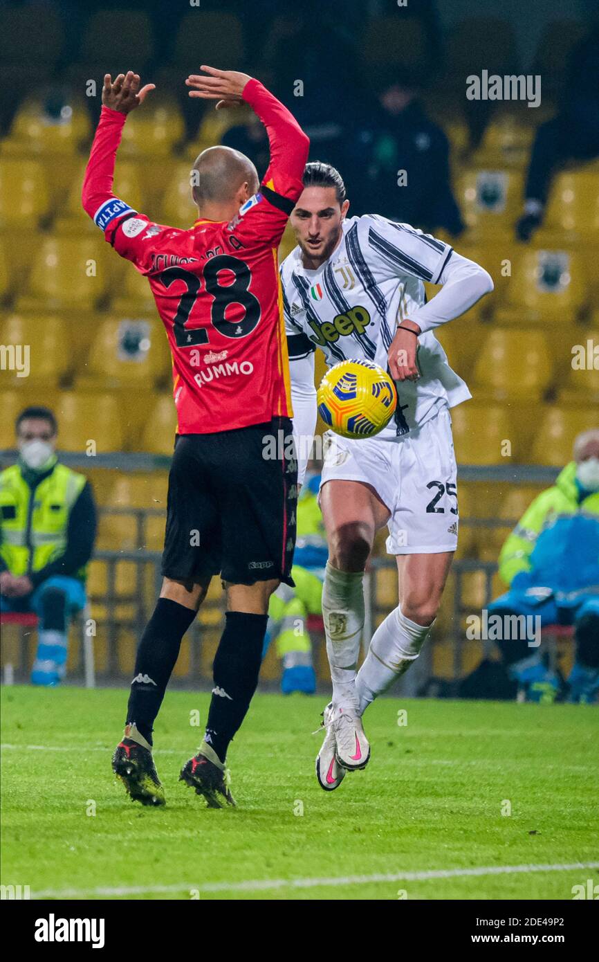 Juventus's French midfielder Adrien Rabiot (R) challenges for the ball with Benevento's Italian midlefer Pasquale Schiattarella during the Serie A  fo Stock Photo