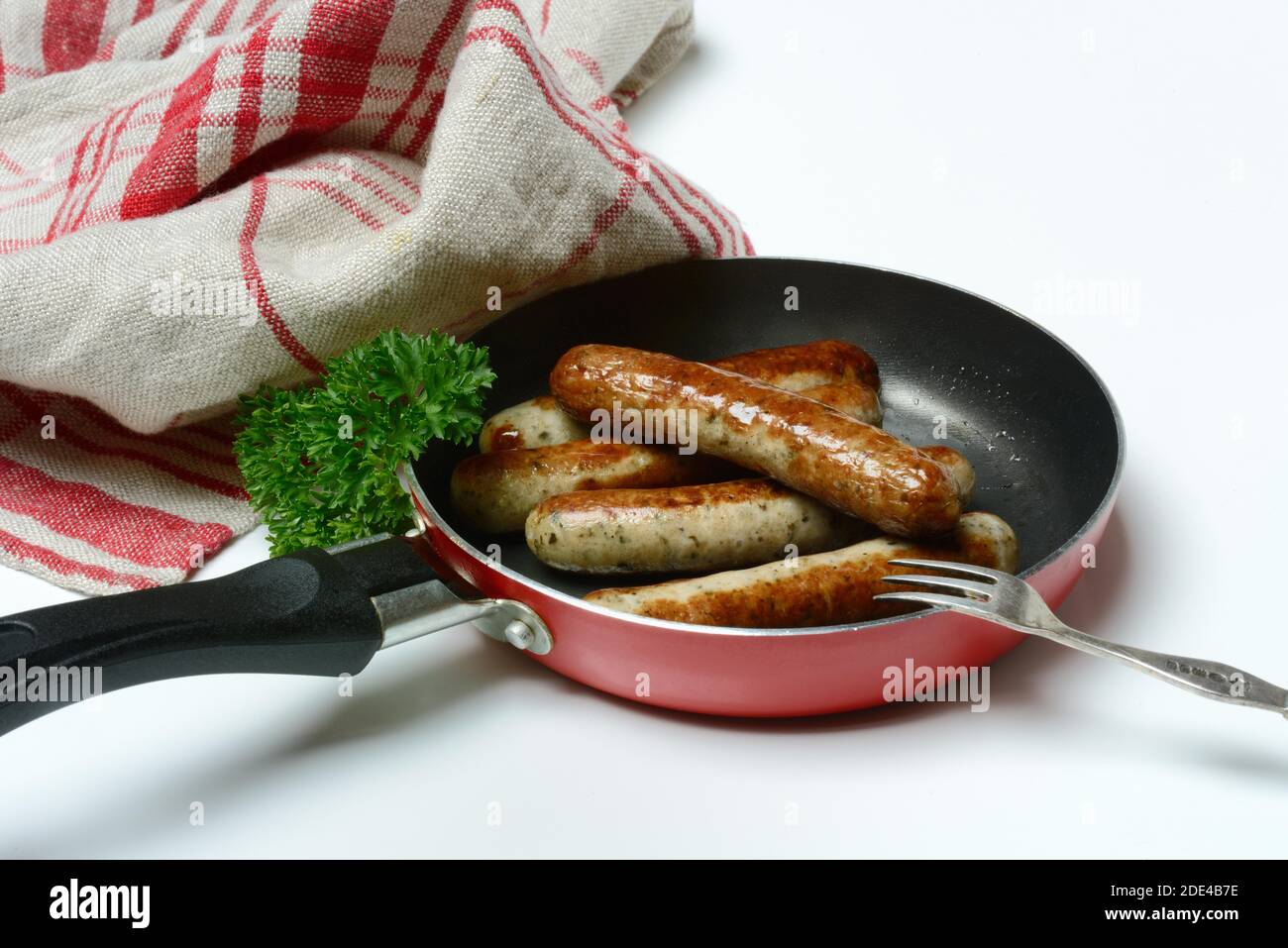 Nuremberger Rostbratwurstchen in pan, roasted, Germany Stock Photo