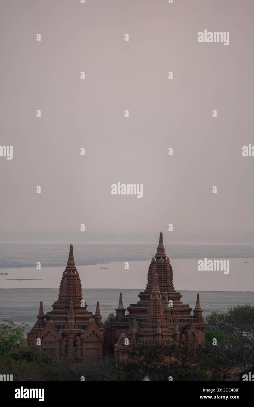 Two identical temples near the Irrawaddy River, Bagan, Myanmar Stock Photo