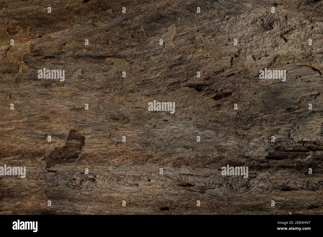 Rough and old dark brown wood texture background. Stock Photo