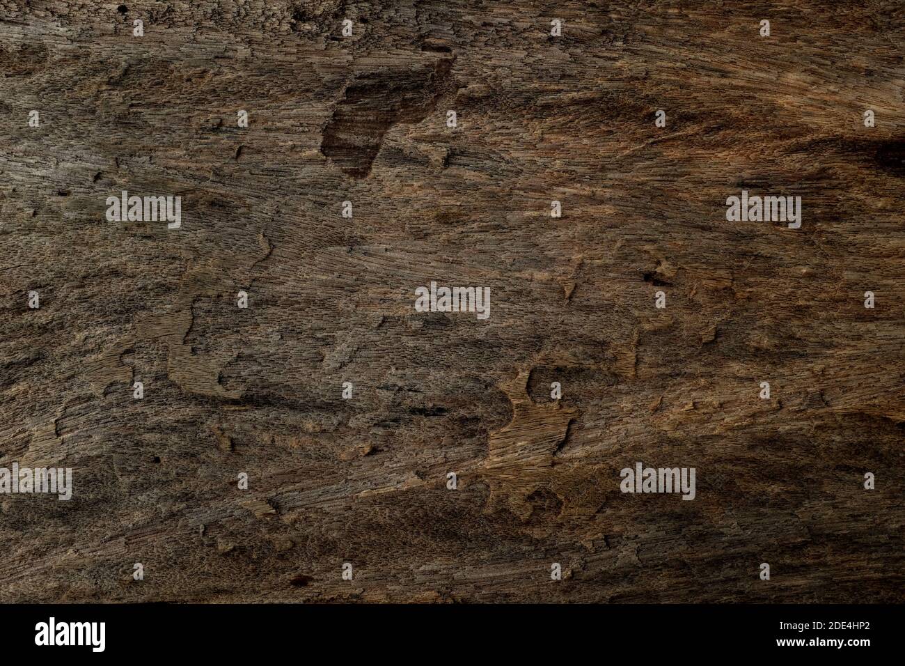 Rough and old dark brown wood texture background. Stock Photo