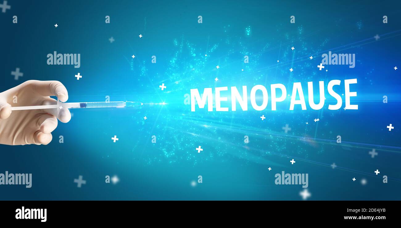 Syringe, medical injection in hand with MENOPAUSE inscription, medical