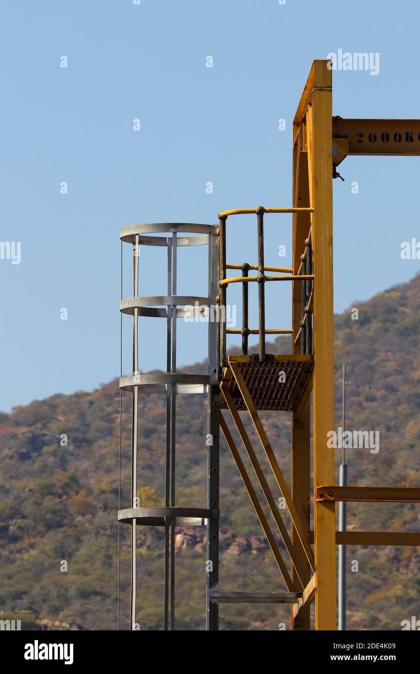 Industrial Loading Hoist Tower With Ladder Stock Photo