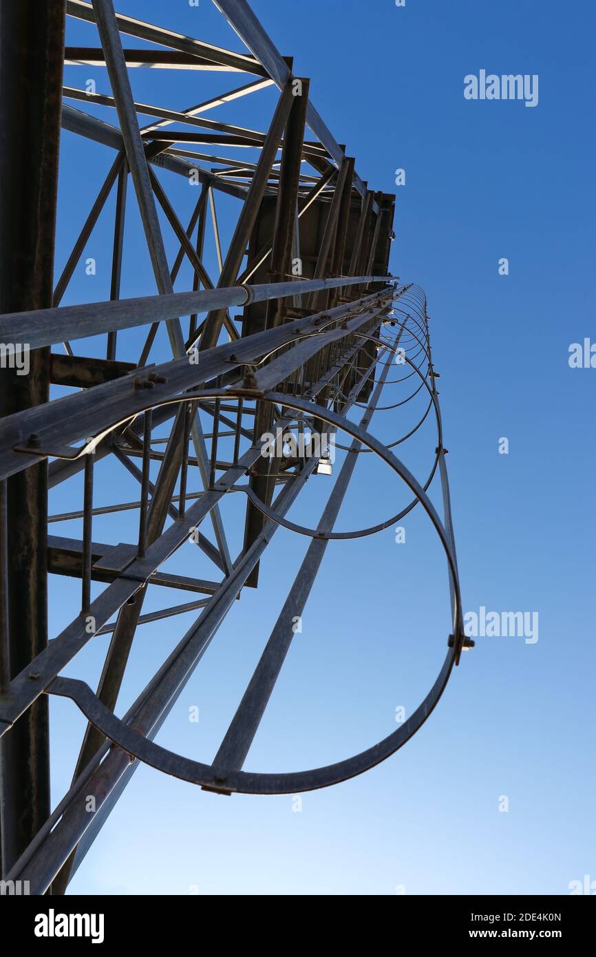 Guarded Ladder On Galvanized Steel Frame Water Tower Stock Photo