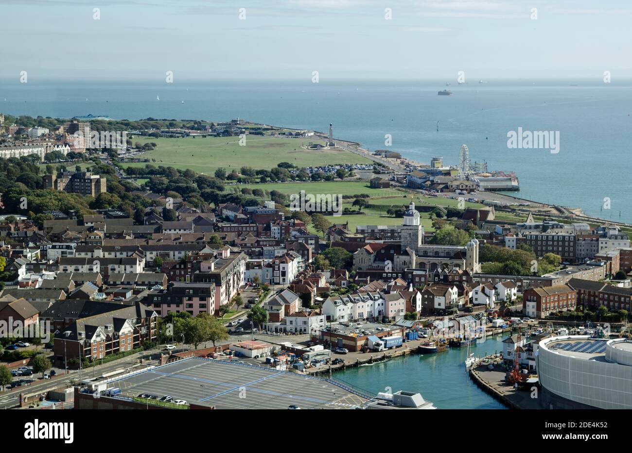 Aerial view across Portsmouth with the historic cathedral, and beyond to Southsea Common with the funfair and beach. Stock Photo