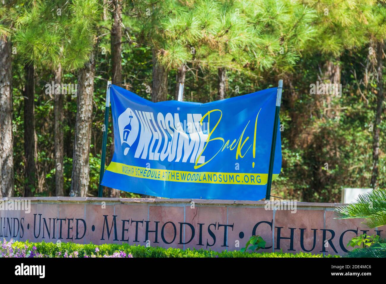 The Woodlands United Methodist Church sign members back as it