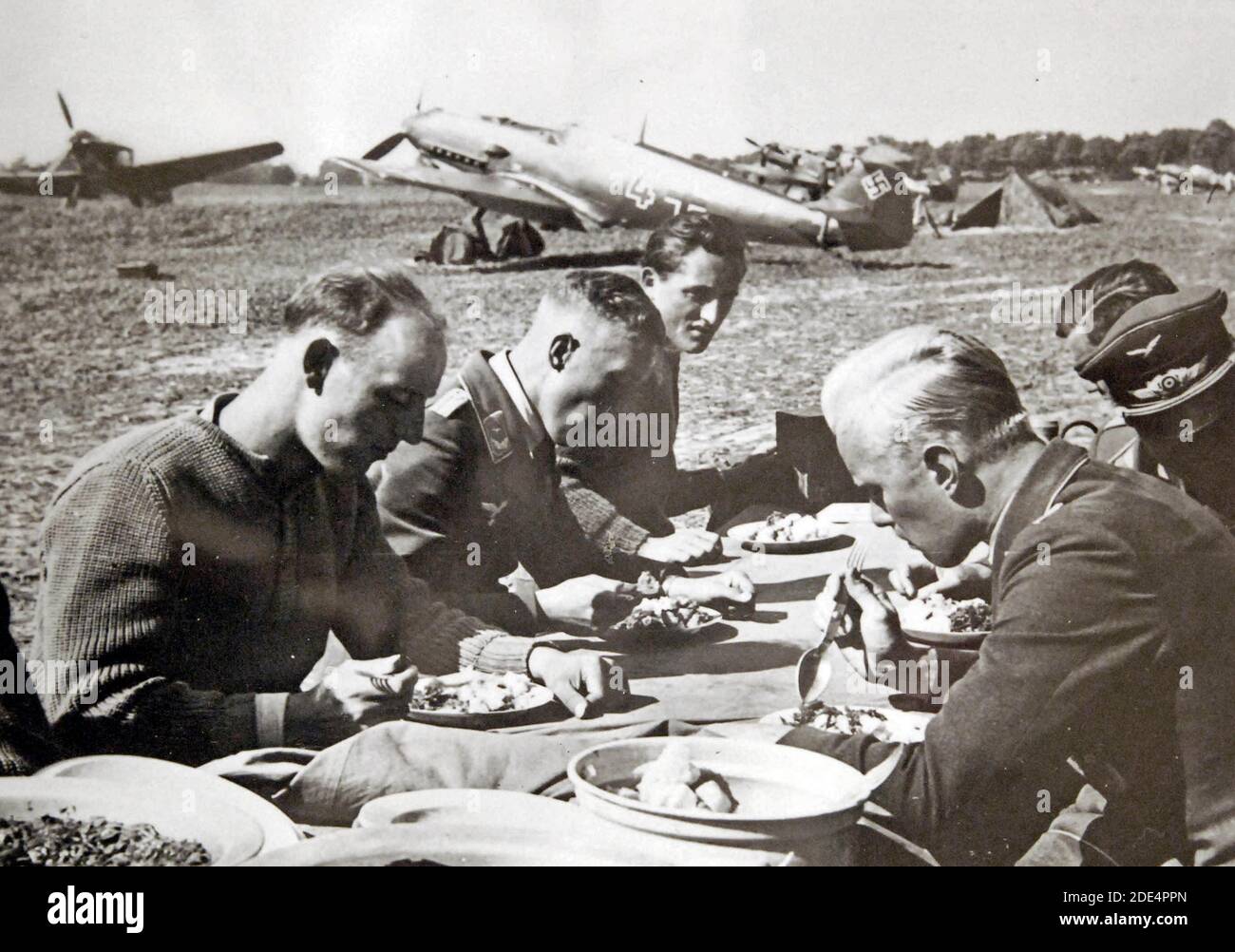 WWII -  German Invasion of Poland, September 1939. Translated German reads, German aviators have an outdoor lunch in the east, September 1939 Stock Photo