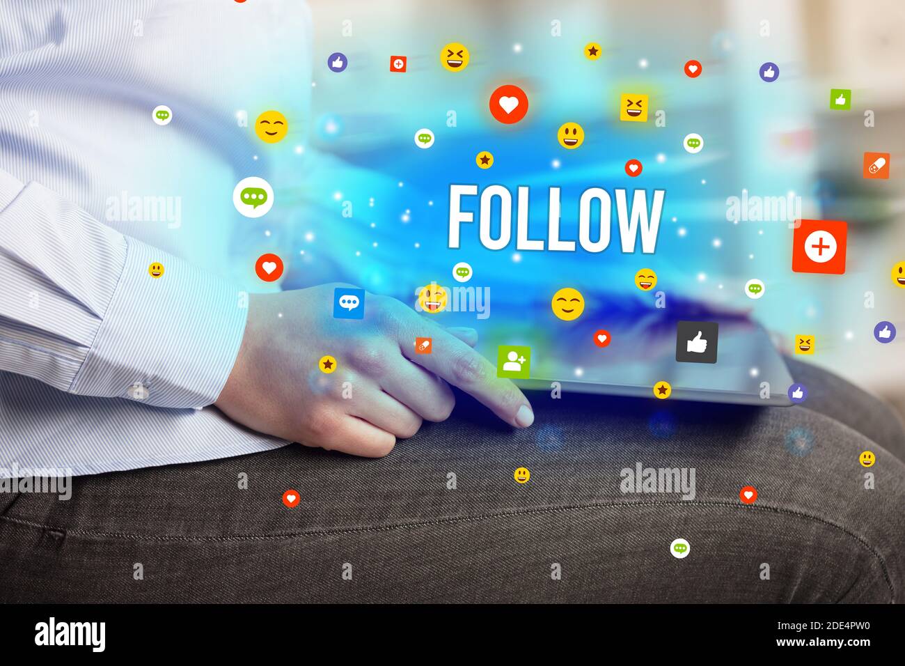 Close up of business person playing multimedia with social media icons ...