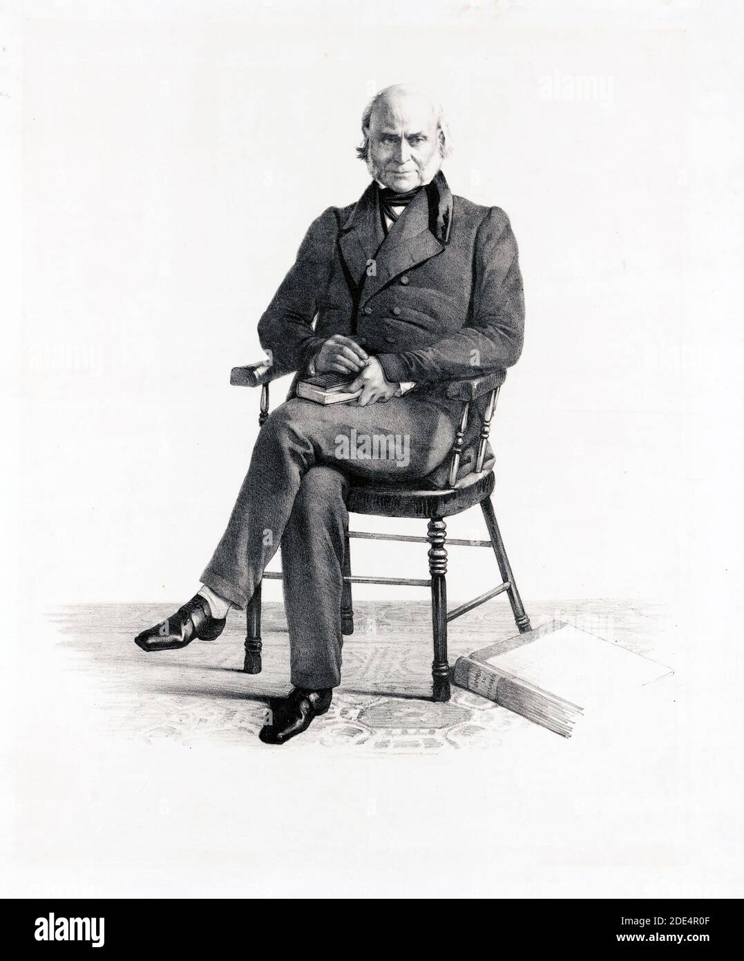 Print shows John Quincy Adams, full-length portrait, seated in a chair, facing front Stock Photo