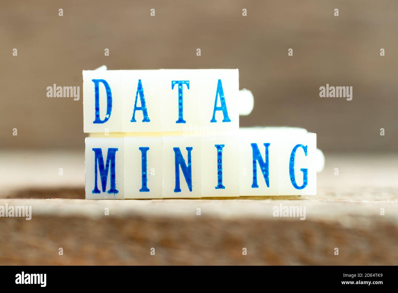 Letter block with blue color word data mining on wood background Stock Photo