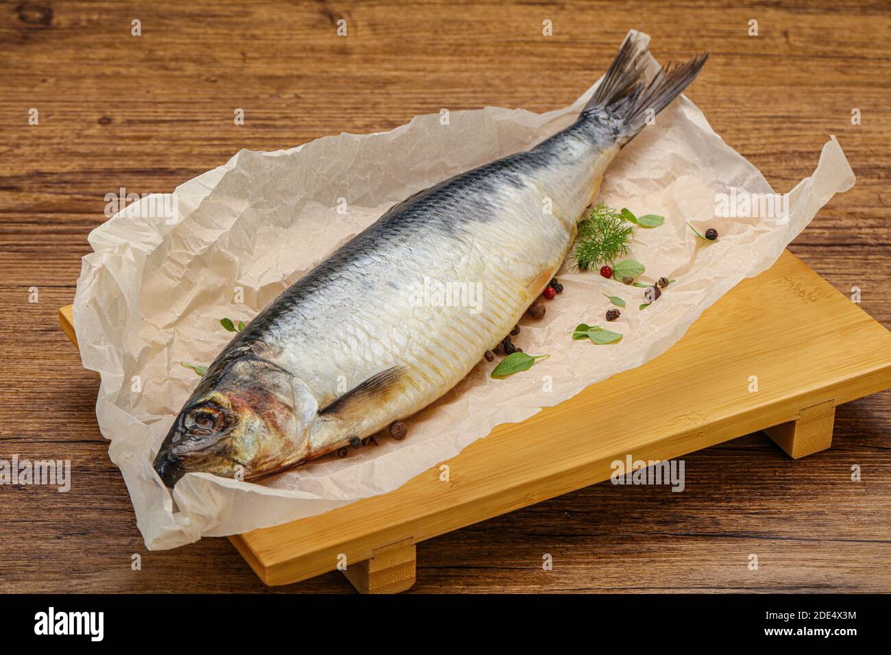 Salted Herring fish with pepper and spices Stock Photo - Alamy