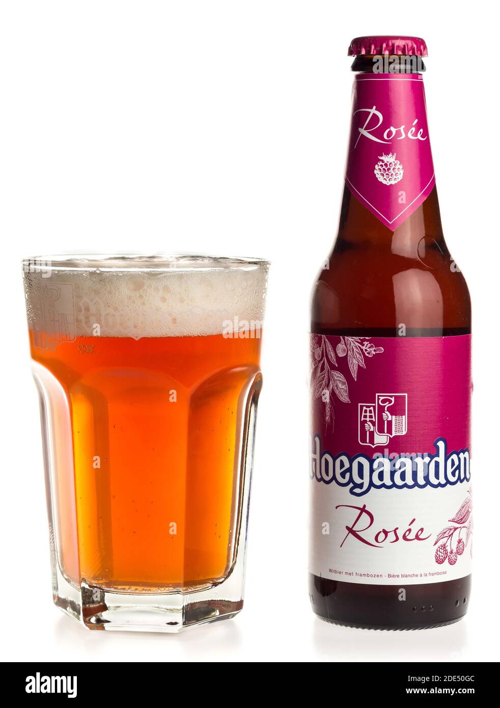 Bottle and glass of Belgian Hoegaarden Rosee fruit beer isolated on a