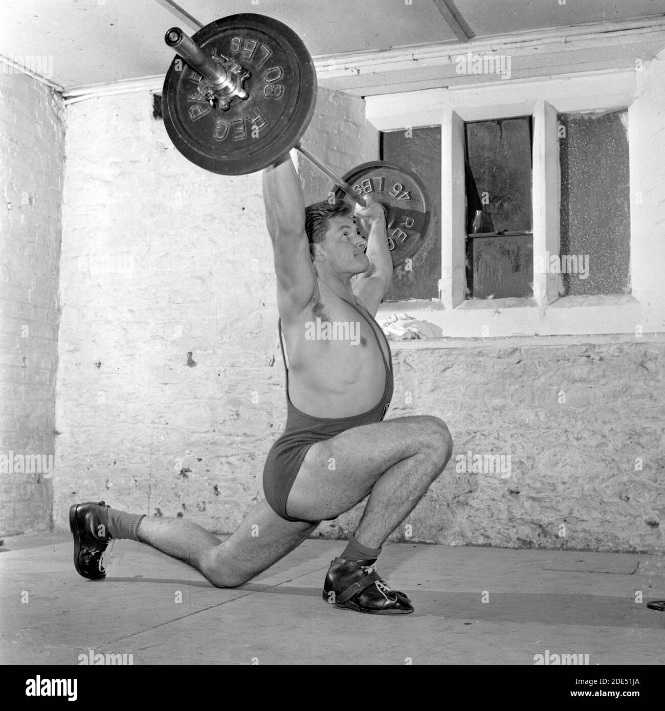 File photo dated 16/10/62 of weight-lifting champion Dave Prowse, aged 27, training at home town for the Empire Games in Perth, Australia. Dave Prowse, the Bristol actor who played Darth Vader in the original Star Wars trilogy, has died aged 85. Stock Photo