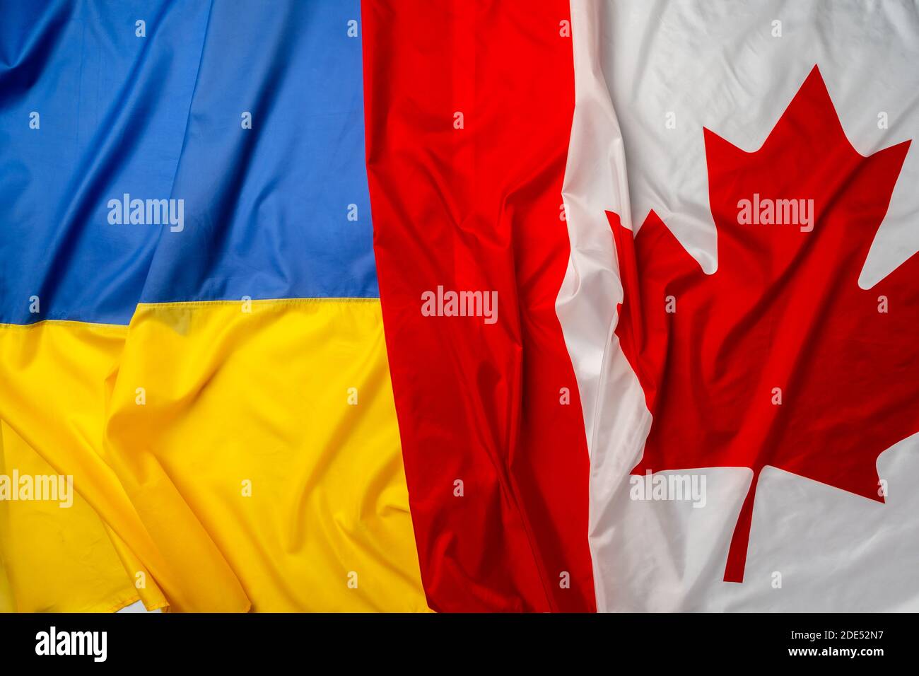 flags-of-ukraine-and-canada-folded-together-stock-photo-alamy